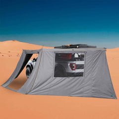 Nomadic Awning 180 Degree Side Wall with Window - Dark Gray With Storage Bag lifestyle