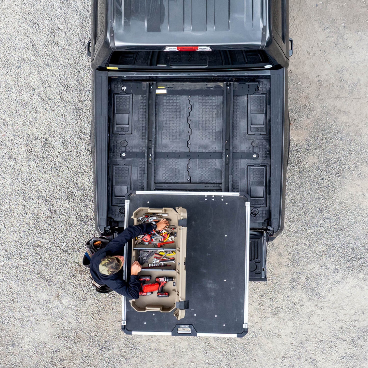 [A0034-CTRK] A top down view of a Desert Tan DECKED Honcho D-co case mounted to a CargoGlide that is mounted on a Drawer System. Whoa.