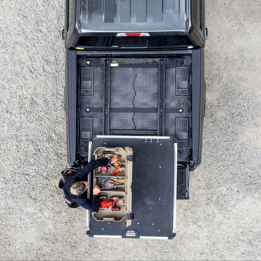 [A0034-CTRK] A top down view of a Desert Tan DECKED Honcho D-co case mounted to a CargoGlide that is mounted on a Drawer System. Whoa.