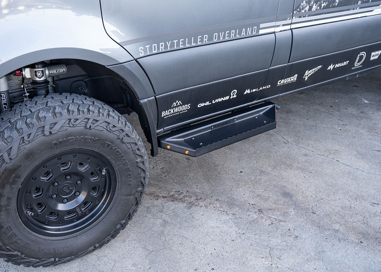 Top view of universal ROAMBUILT short side step for Mercedes Sprinter – shows black textured surface and raised grip edge for slip resistance.