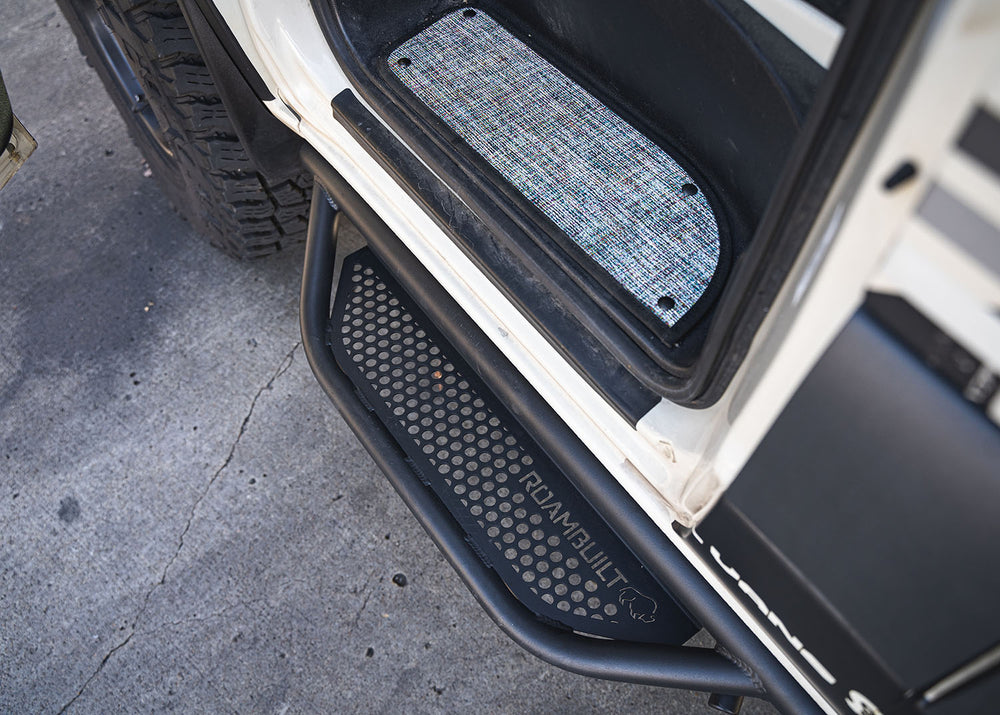 Top-down view of the ROAMBUILT Mercedes Sprinter Side Step – Driver Side, showing the full step with perforated aluminum decking, no mounting brackets visible.