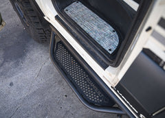 Top-down view of the ROAMBUILT Mercedes Sprinter Side Step – Driver Side, showing the full step with perforated aluminum decking, no mounting brackets visible.