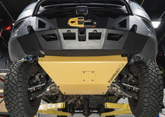 Underside view of the Roambuilt Mercedes Sprinter skid plate showing the removable oil change access panel, mounted together with the LoPro front bumper for full front-end protection.