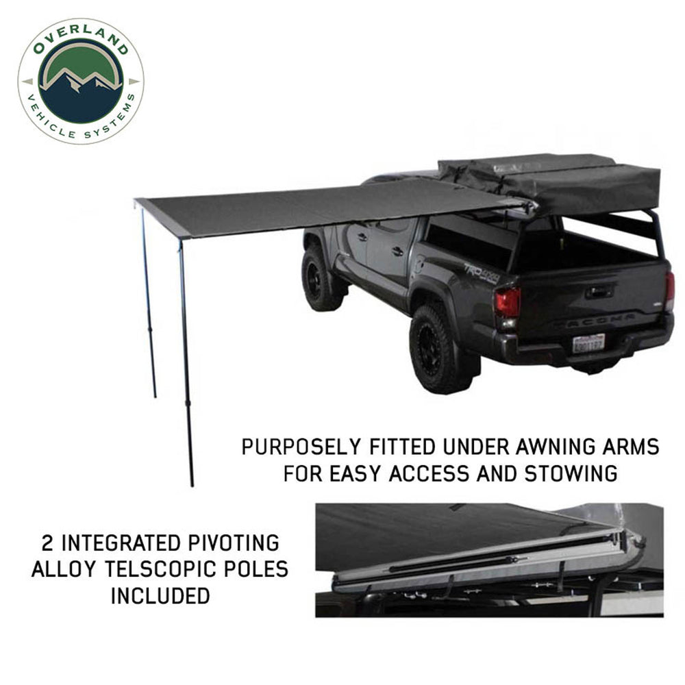 HD Nomadic 90 Degree Awning - Grey Body, Green Trim & Black Travel Cover With Poles Down