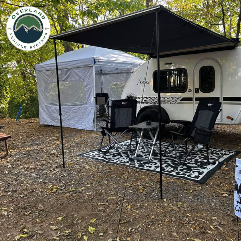 HD Nomadic 90 Degree Awning - Grey Body, Green Trim & Black Travel Cover Lifestyle