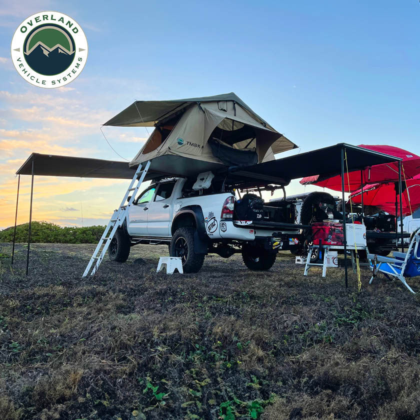 HD Nomadic 90 Degree Awning - Grey Body, Green Trim & Black Travel Cover Lifestyle