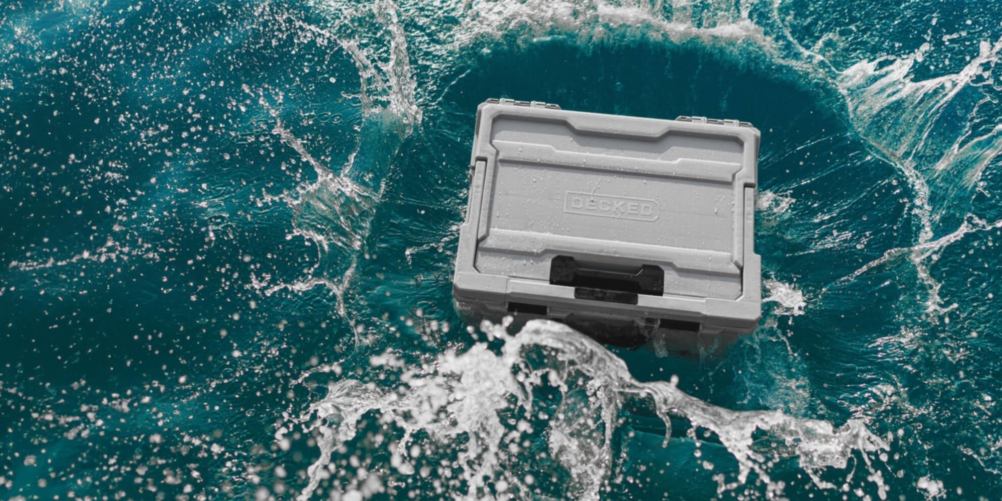 [A0020-HRAK-GRY] @expanded The Cool Gray Halfrack splash-landing into crystal clear blue water.