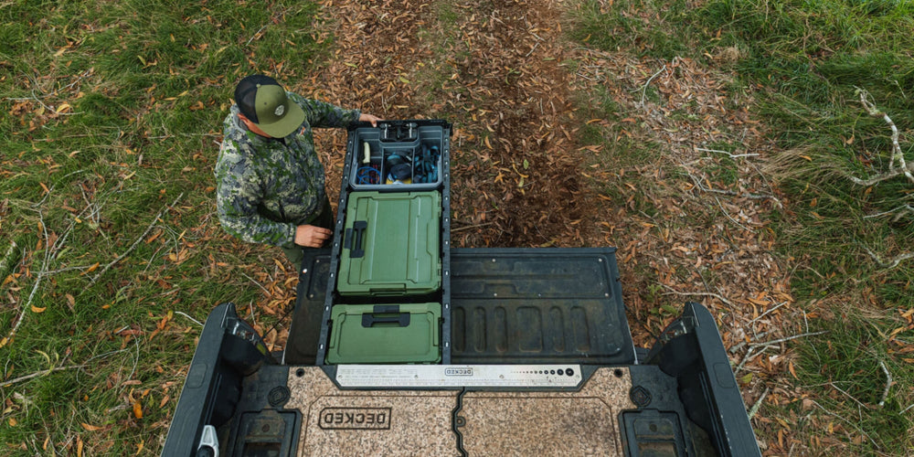 [A0020-HRAK-GRN] @expanded A hunter closing his DECKED Drawer System that is neatly organized with a Ranger Green Halfrack and Sixer.