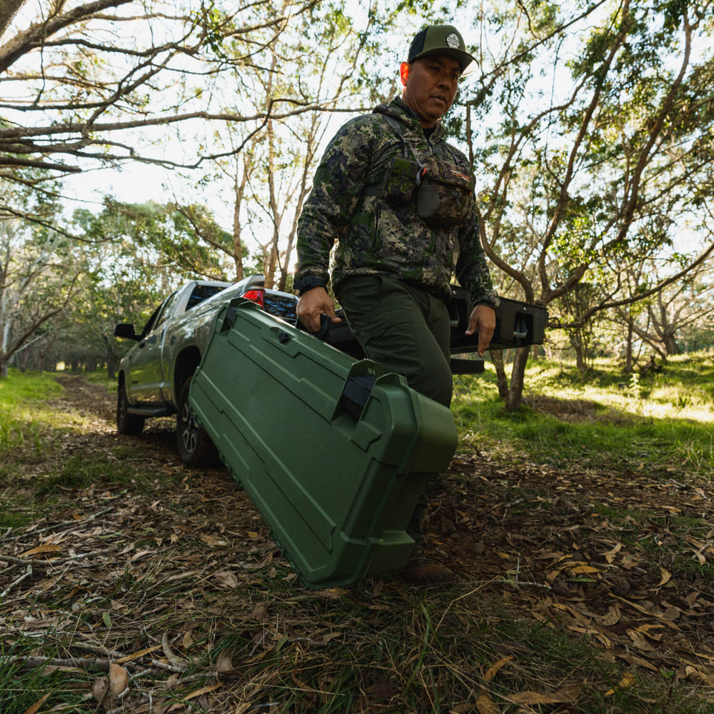 [A0031-MANF-GRN, A0030-MMAN-GRN] DECKED ambassador, Justin Lee, retrieving his Ranger Green Honcho 80 from his DECKED Drawer System.