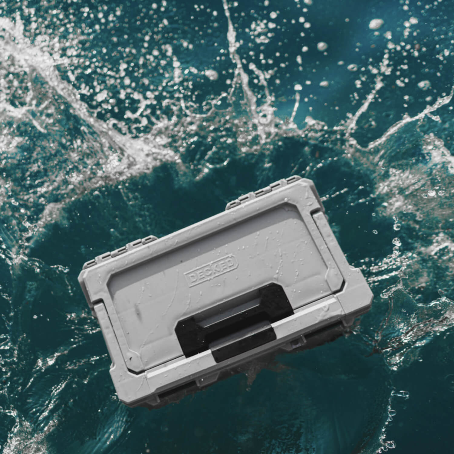 [A0010-SIXR-GRY] The Cool Gray Sixer splash-landing into crystal clear blue water.