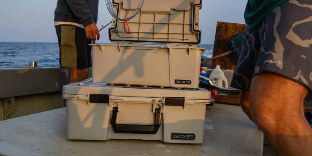[A0010-SIXR-GRY] @expanded The Cool Gray Sixer, full of fishing supplies, on board of a fishing boat at sunset.
