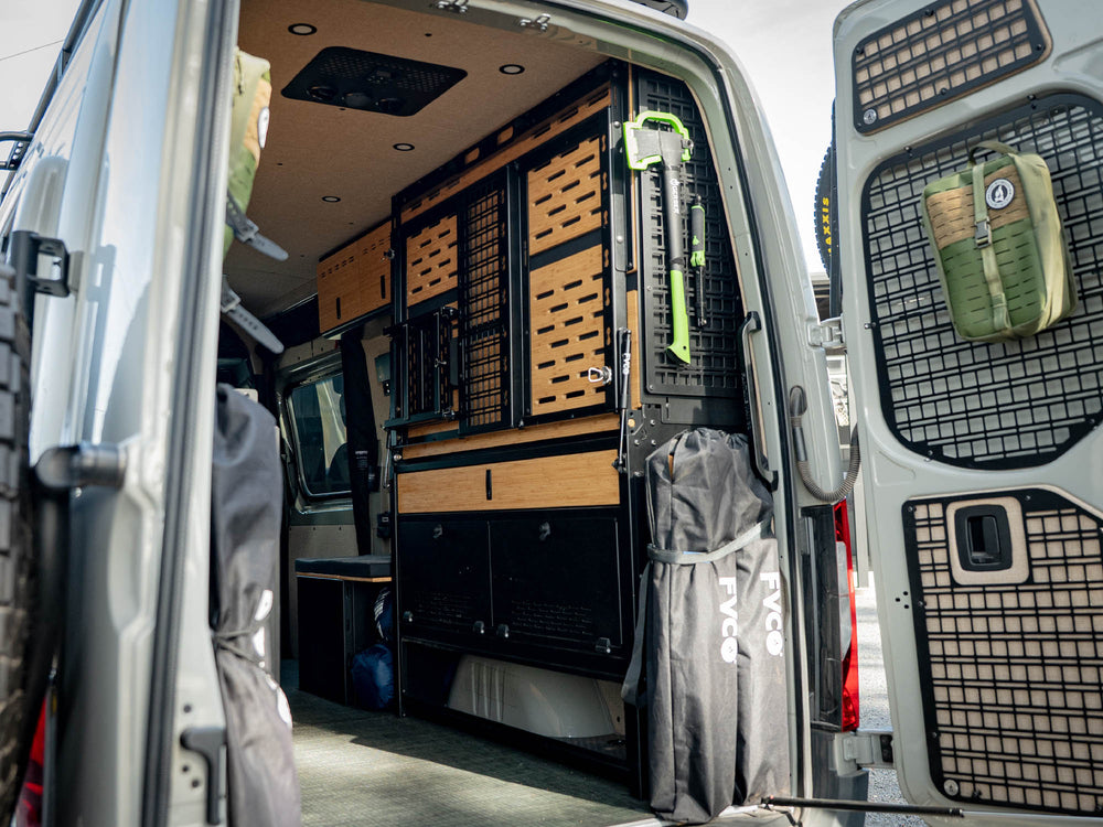 Sprinter adventure van with rear door molle panels and Sprinter Van Rear Door Grab Handle installed