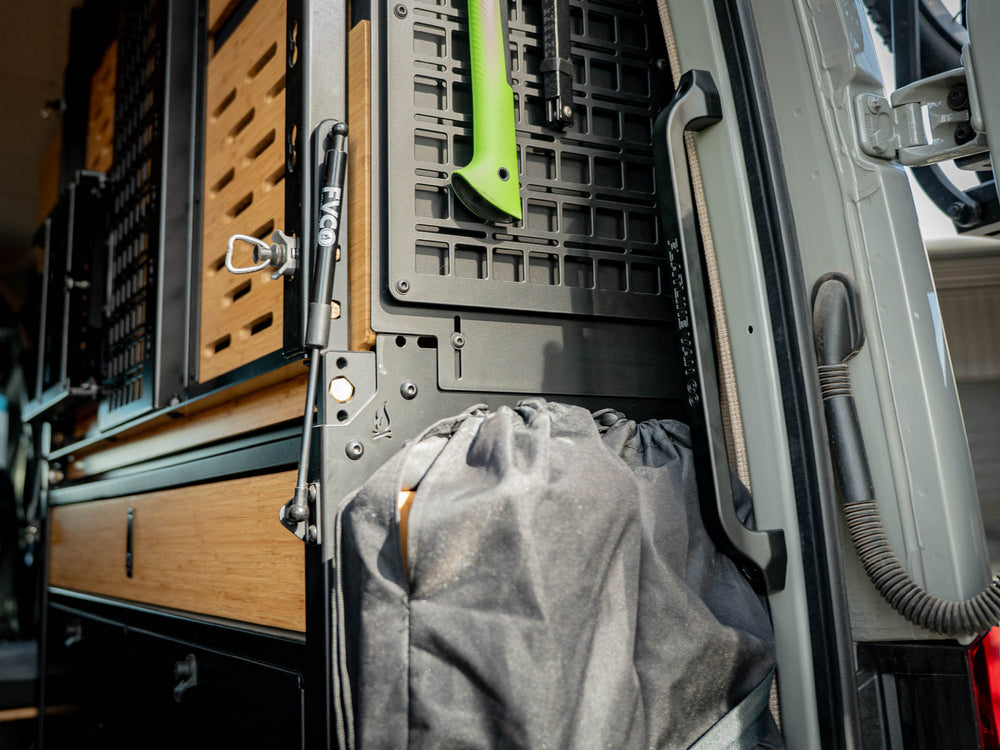 Sprinter Van Rear Door Grab Handle with black logo installed in Sprinter van