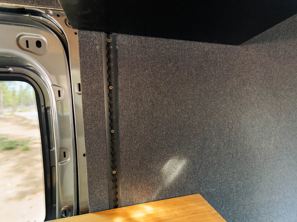 Small section of the Transit Bed Bracket Flush Mount L-Track cut to fit custom area in van