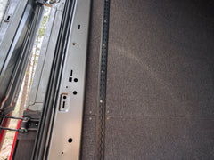 Transit Bed Bracket Flush Mount L-Track installed in van with insulated walls