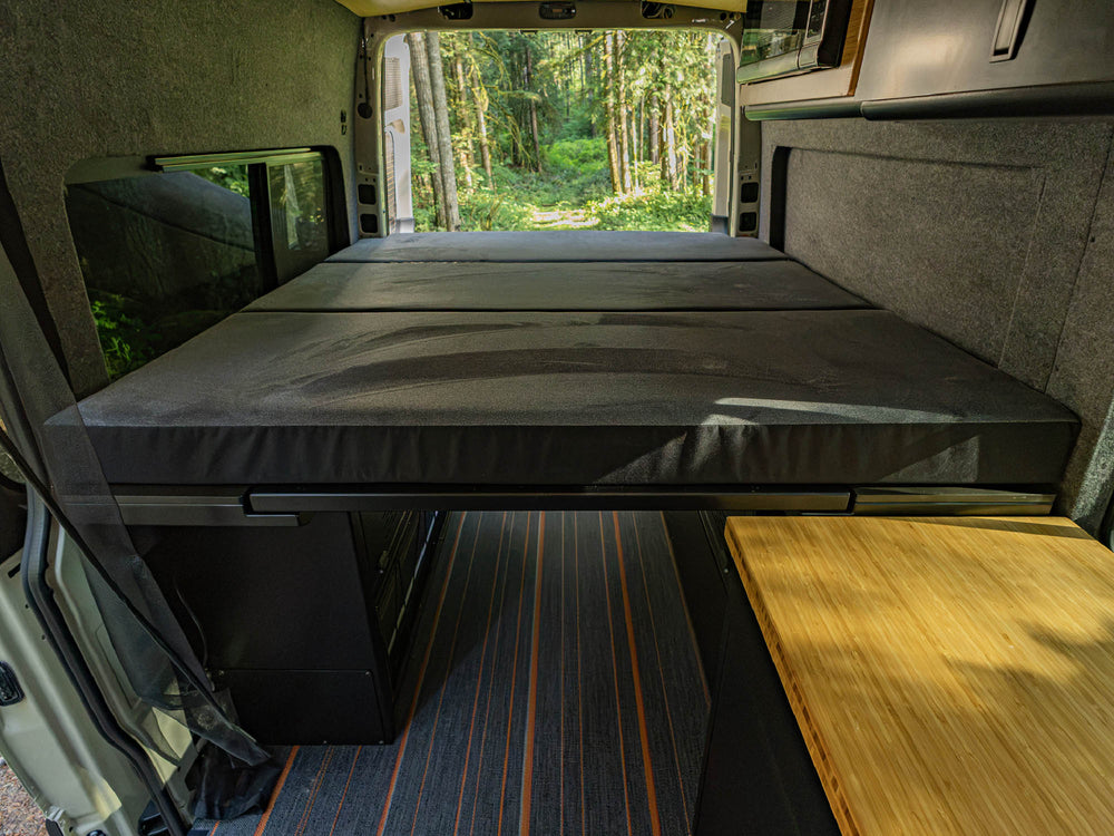 Modular Cabinet Bed System for Sprinter & Transit installed with custom fit mattress