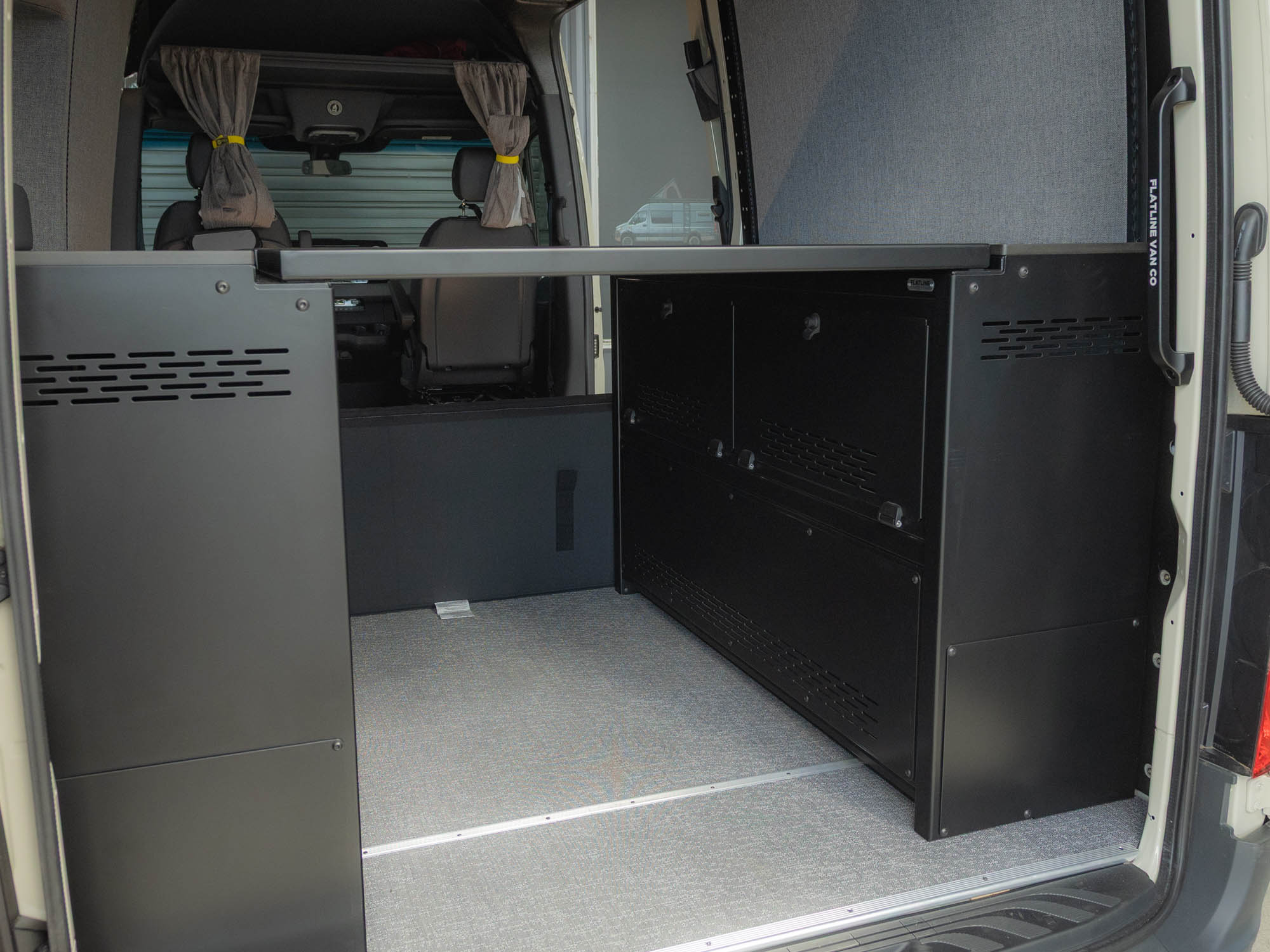 View of Modular Cabinet Bed System for Sprinter & Transit in East-West orientation installed in SPrinter 144