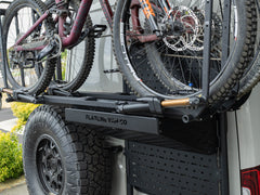 Mountain bikes stored on Sprinter Rear Door using Kuat Bike Trays on the Rear Door Platform Bike Rack Adapter