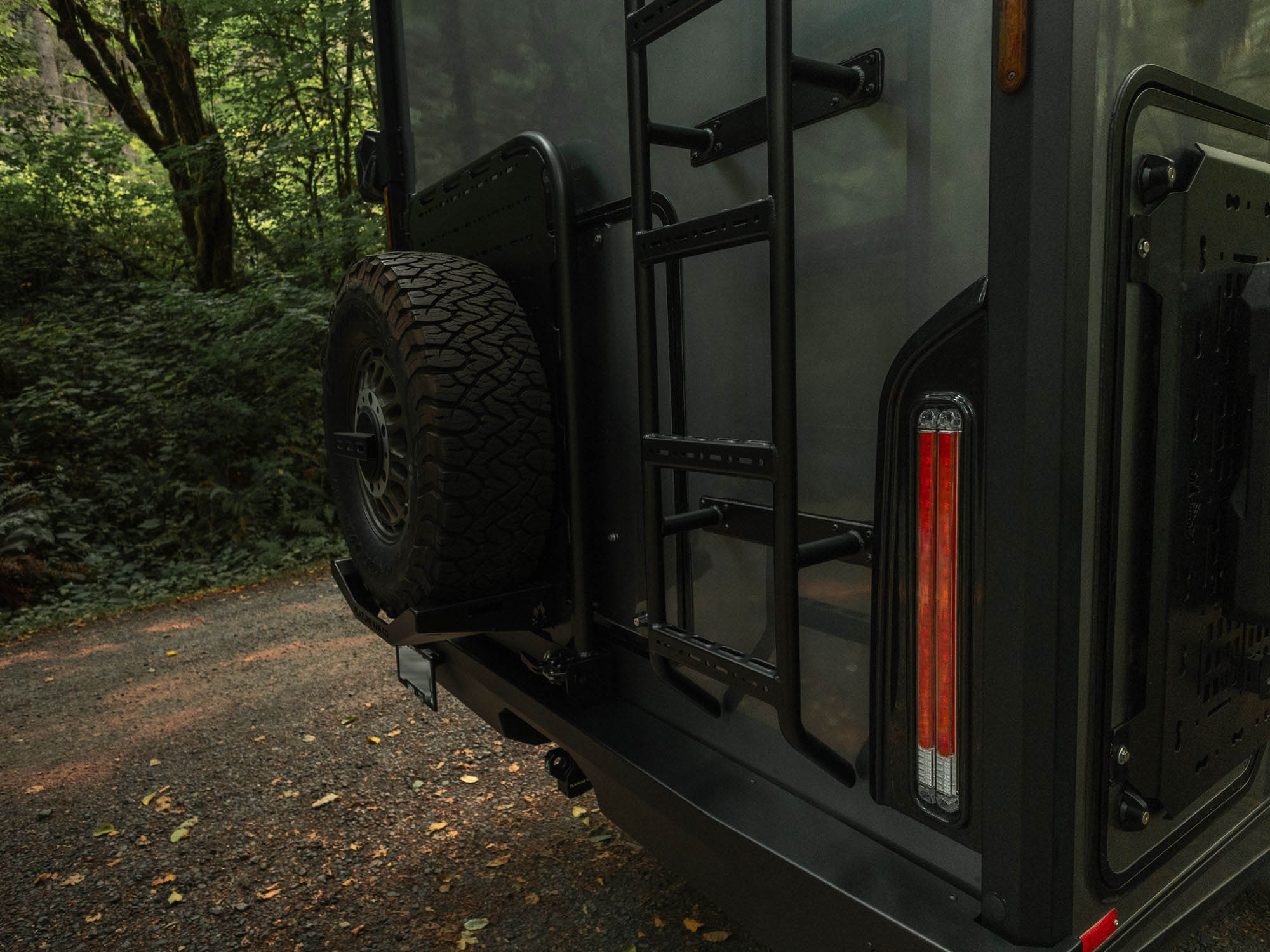 Lower portion of installed Winnebago Ekko Rear Ladder