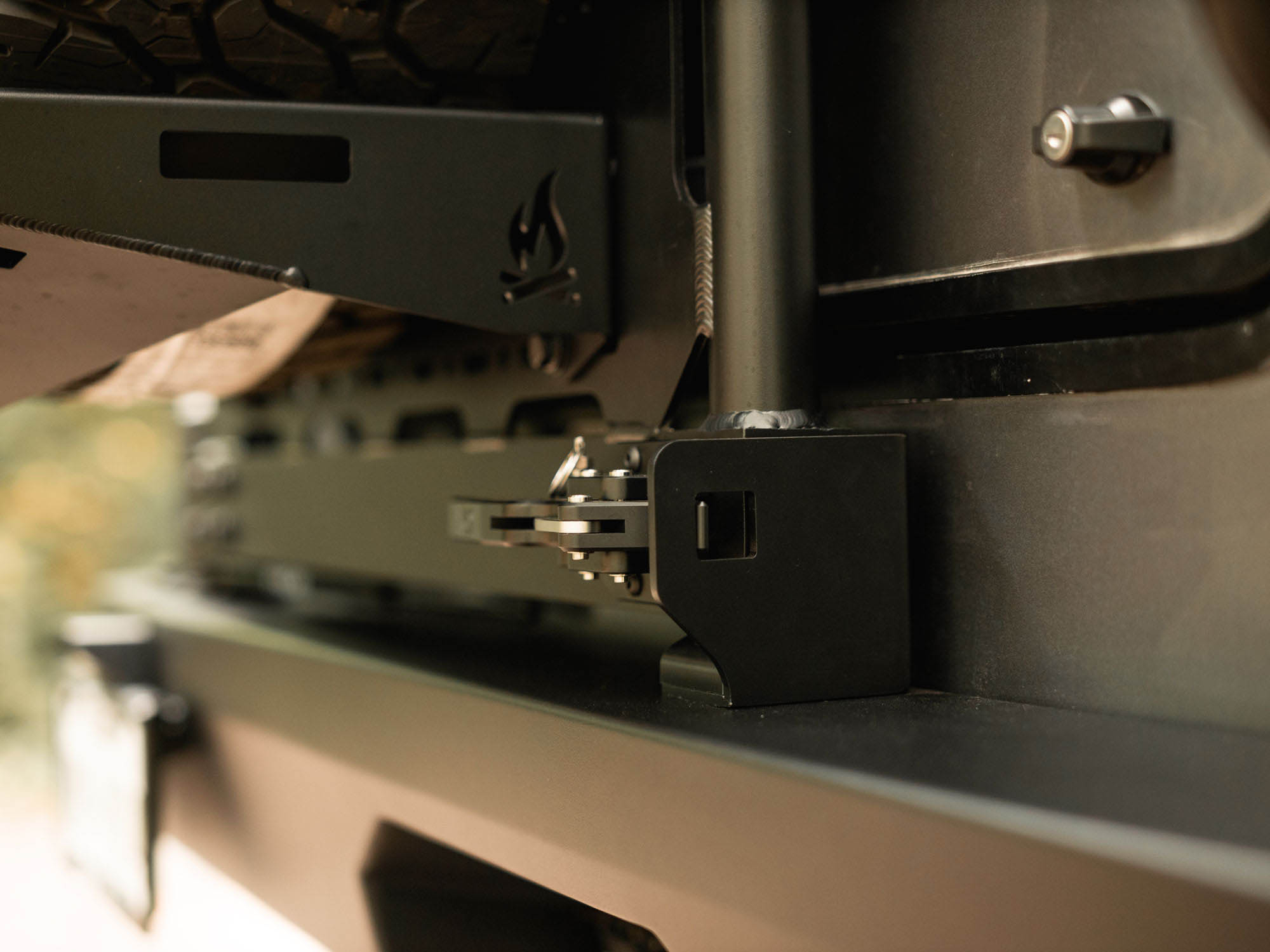 Close up view of Winnebago Ekko Rear Platform mounting to Rear Bumper