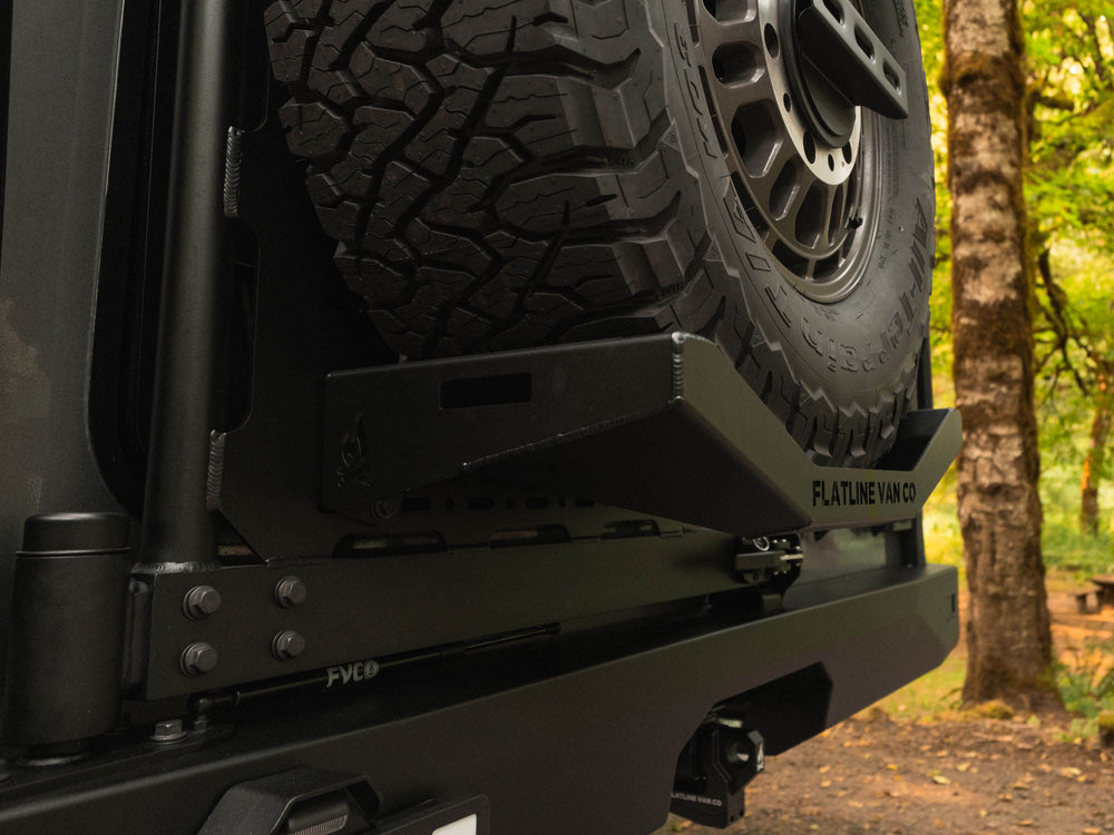 Close up view of Sprinter and Transit Winnebago Ekko Rear Platform Carrier installed to Rear Bumper, with gas strut in view for controlled opening and closing