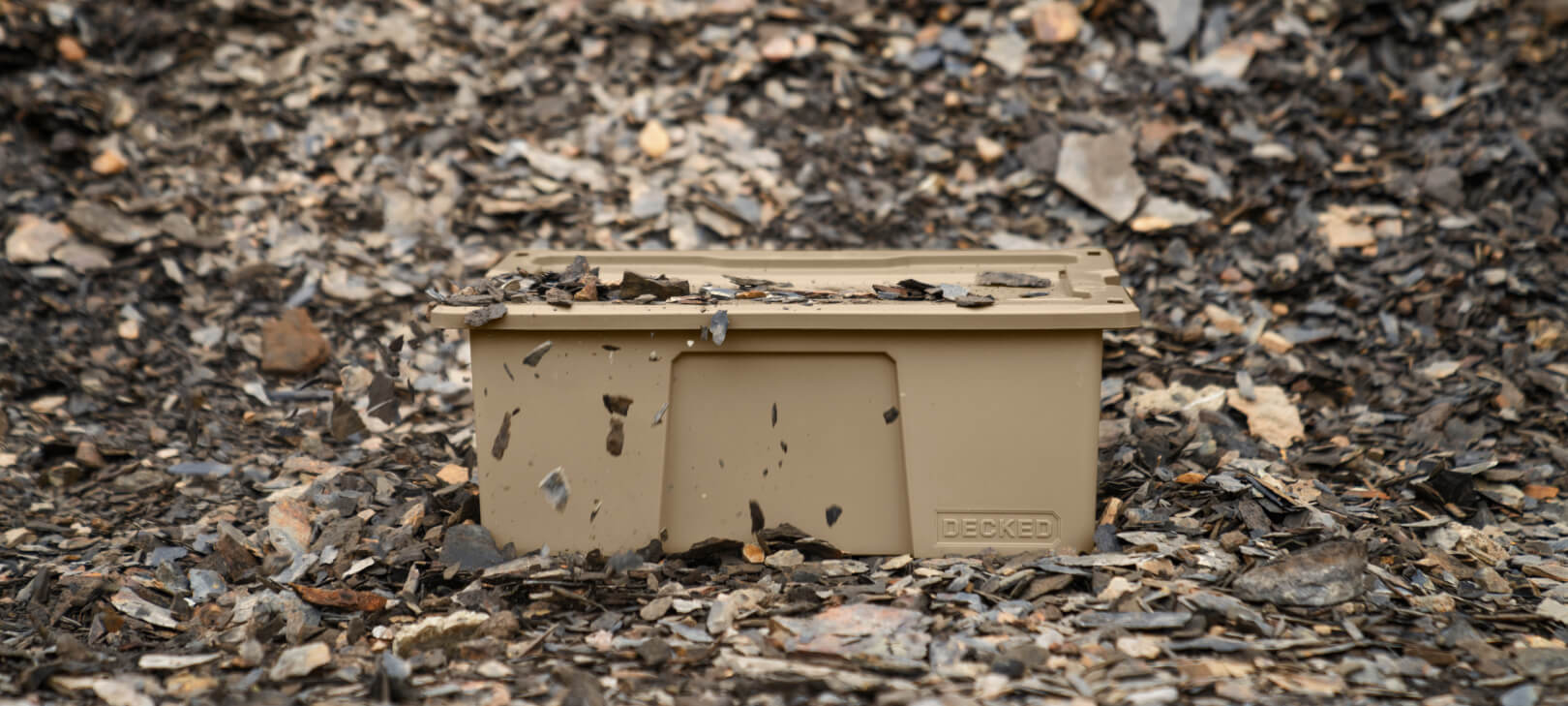 [A0040-DBIN-TAN] @expanded One Tan Payloader sitting in shale