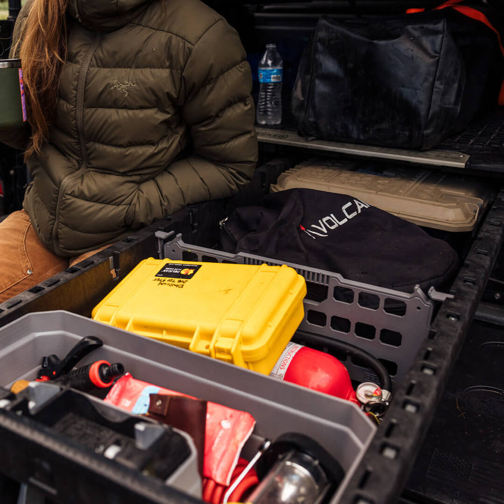 [A0083-4DIV-GRY, A0082-2DIV-GRY] Image of a divider inside a drawer with gear compartmentalized