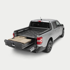 [YF8] Side angle view of a Drawer System installed in a Maverick with the drawer open and one Sixer and two Halfracks inside.