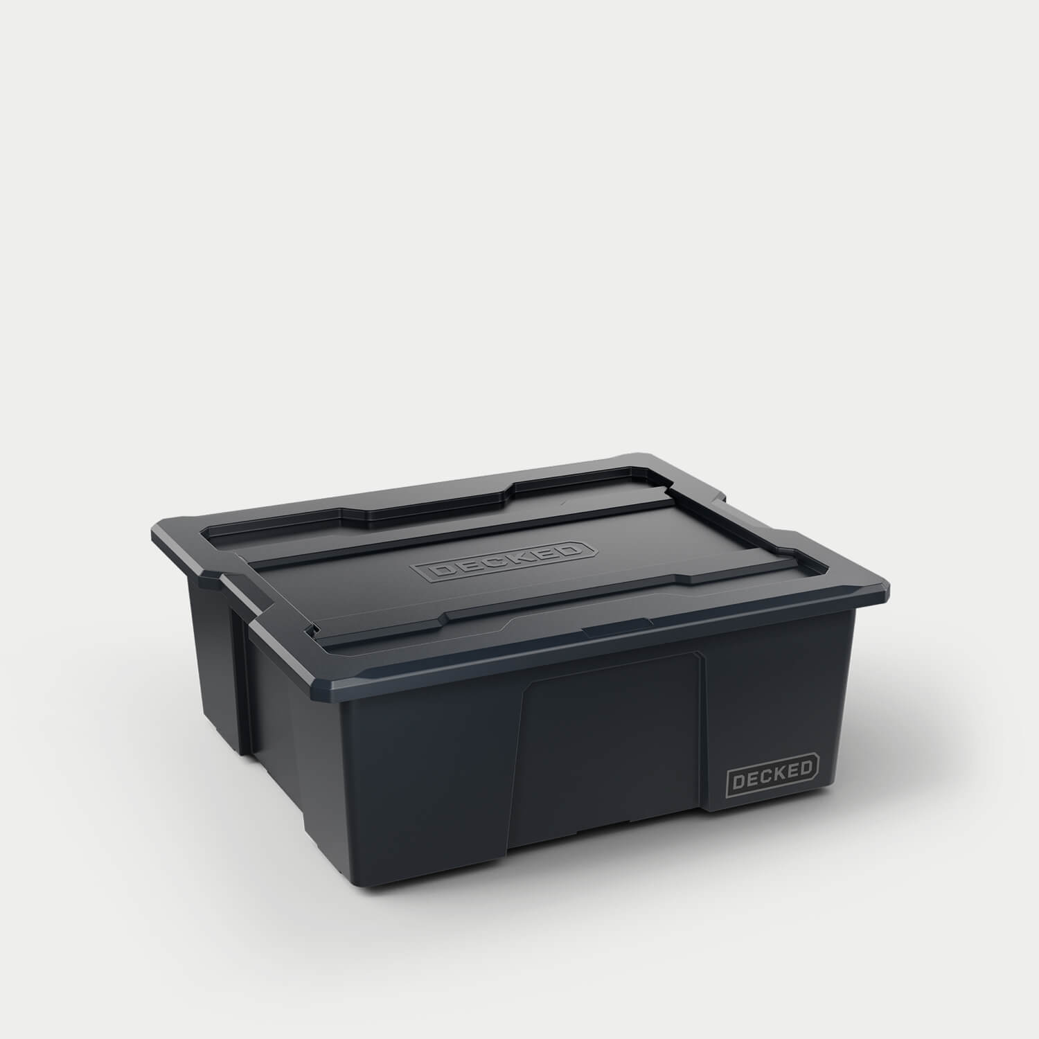 [A0041-DBIN-BLK] One black Payloader bin, closed on a white background with a DECKED logo in the bottom right hand corner of the bin.