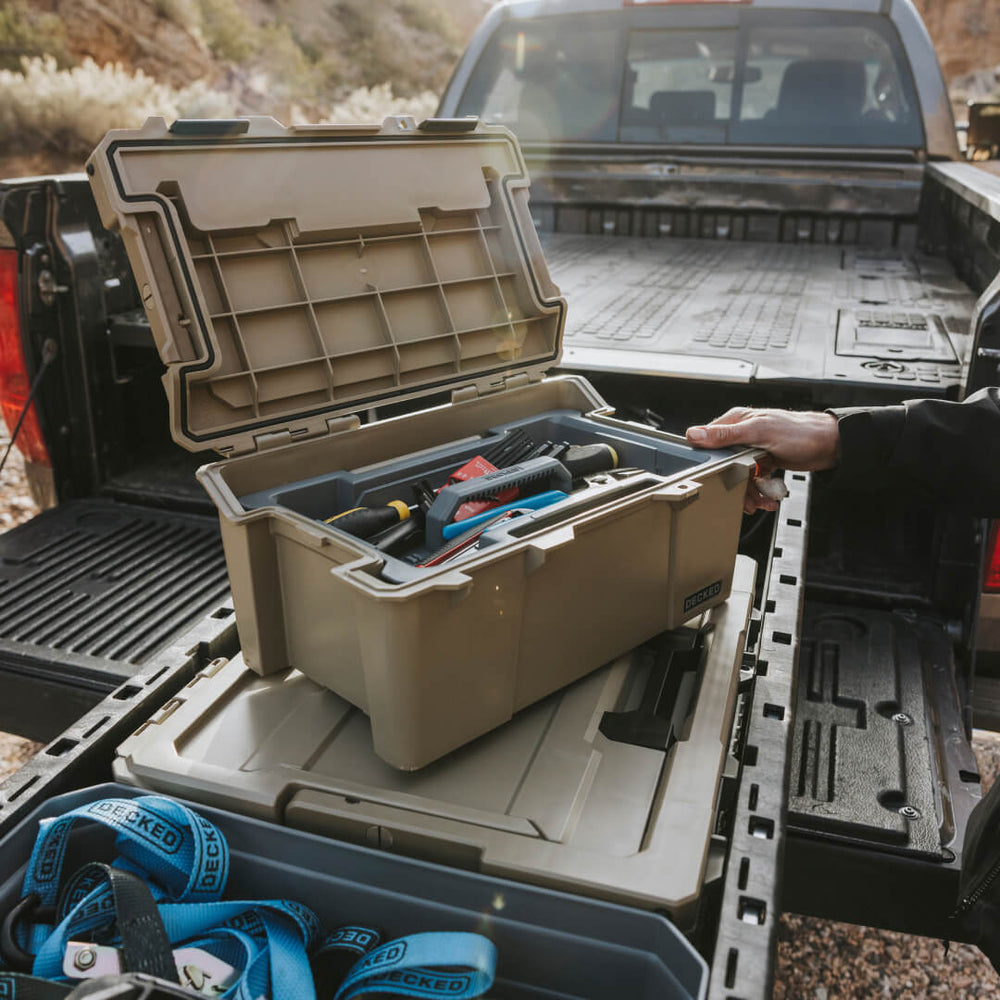 [A0010-SIXR-TAN] An open Desert Tan Sixer D-co Case with screwdrivers and miscellaneous tools inside.