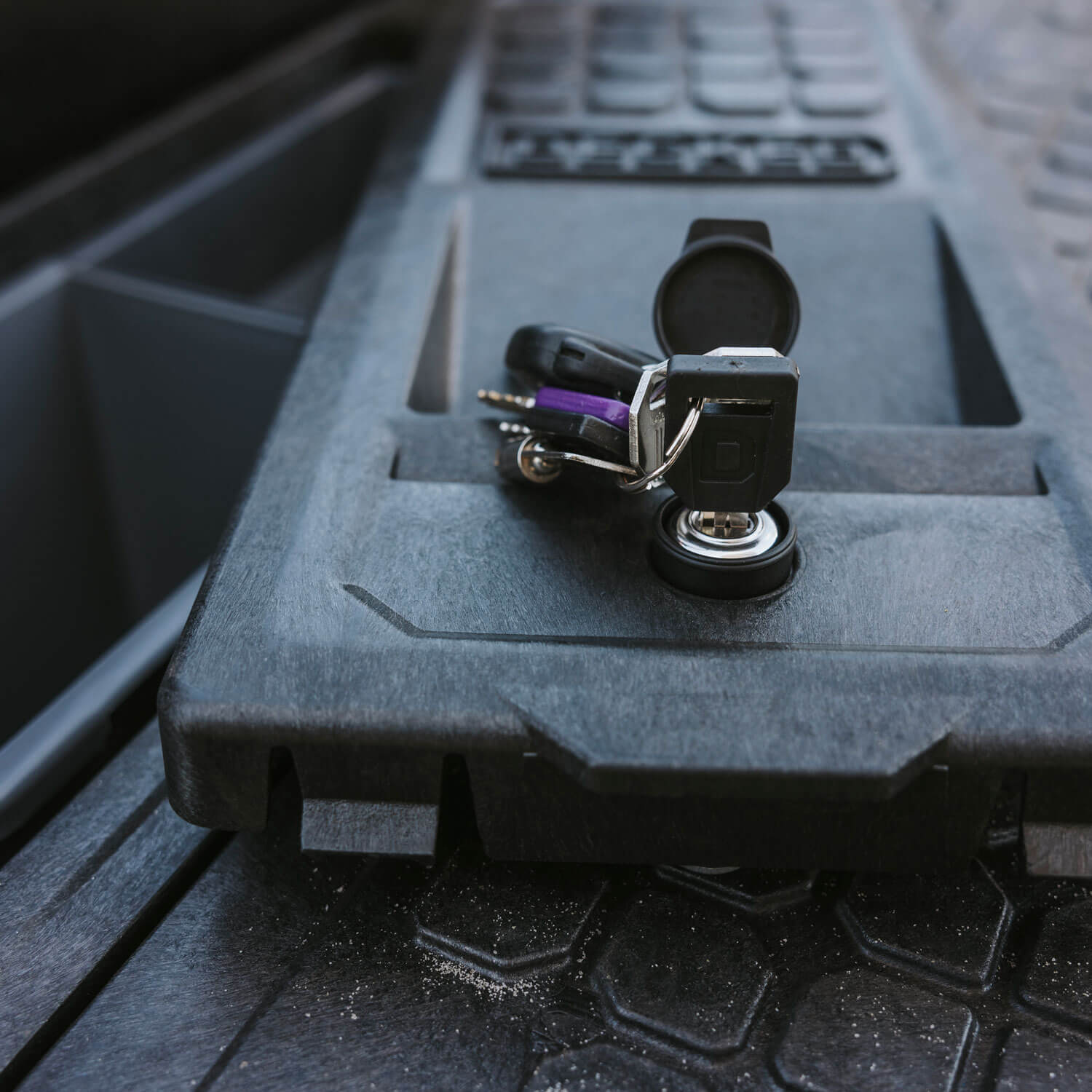 [A0062-LOCK, A0063-LOCK, A0066-LOCK, A0068-LOCK] Close-up of a set of keys that unlocked a stash bin lid on a DECKED Drawer System