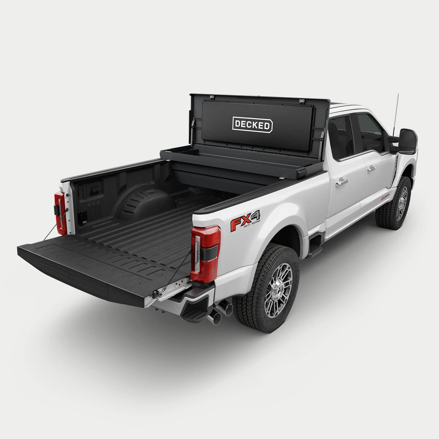 [google-black-tool-box] White pickup truck with a black DECKED Tool Box open in the bed.